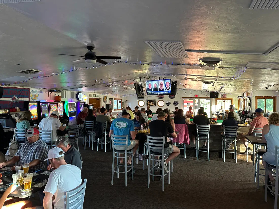 A packed bar on a weekend night at Backyard Brew