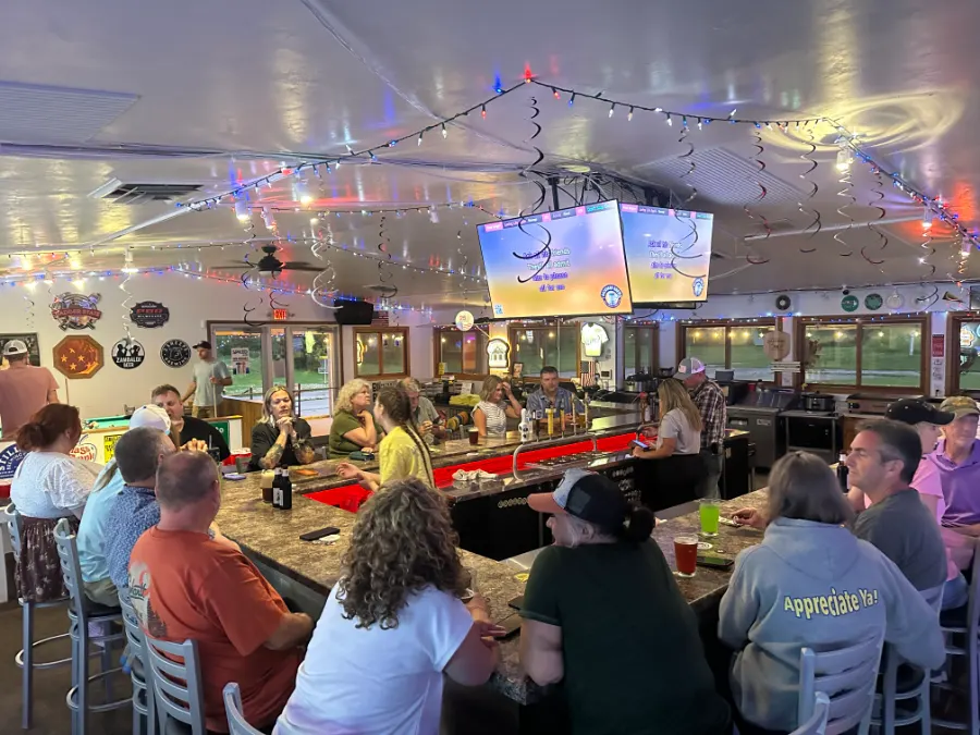 Regulars gathered around the bar at Backyard Brew in Ashwaubenon