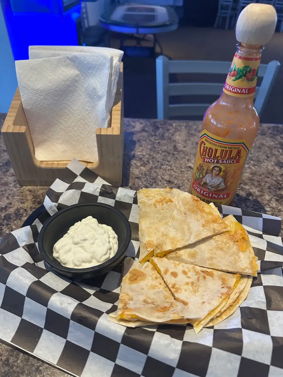 A fresh quesadilla plate from the kitchen at Backyard Brew